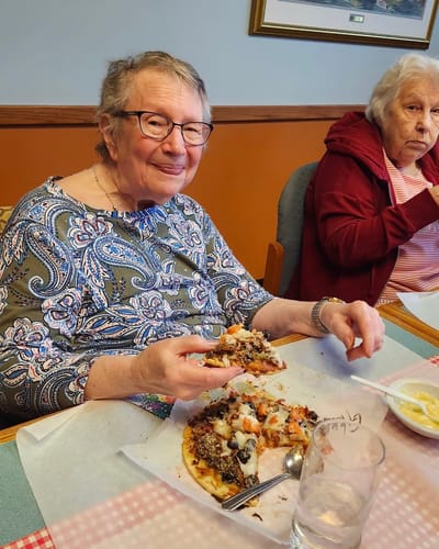 Residents enjoying a meal together