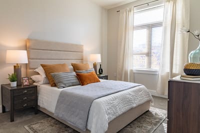 Well-decorated bedroom with natural light