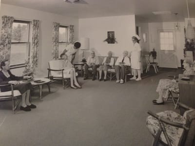 Residents interacting in a social area of the facility