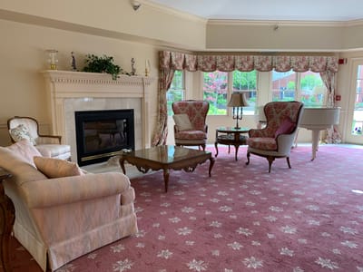 Cozy common area with seating and fireplace