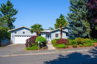 Exterior view of Bellevue Haven AFH with landscaped garden