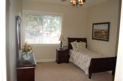 Cozy resident room with a bed and window