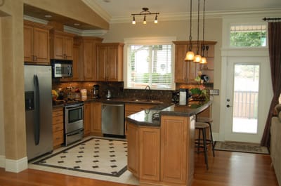 Modern kitchen with wooden cabinets and appliances