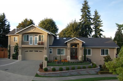 Exterior view of a residential building with gardens