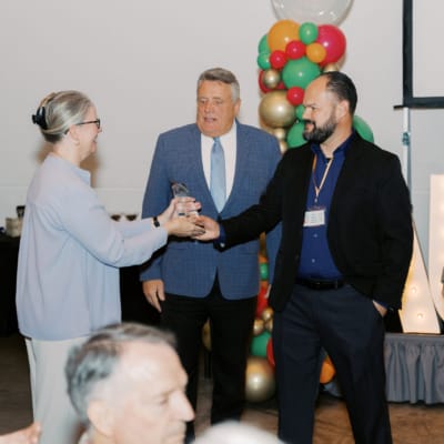 Residents receiving an award during a celebration