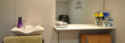 Interior view of a salon area with products on display