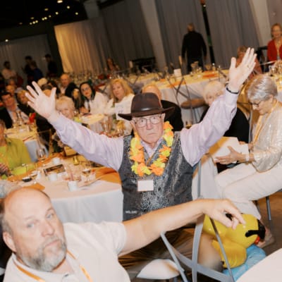 Residents enjoying an event in a dining area
