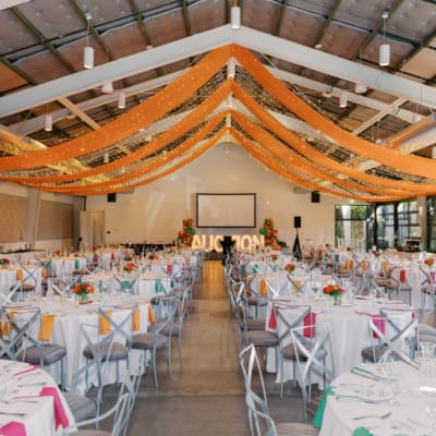 A decorated event space set for an auction
