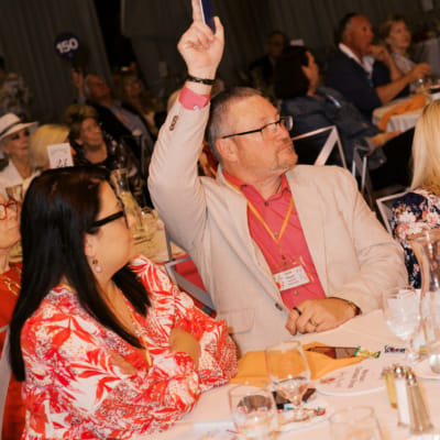 Guests participating in an event at a dining area