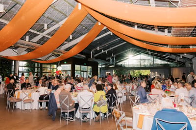 Residents and staff enjoying a festive gathering in an indoor space