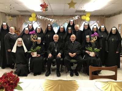 Residents and staff celebrating a milestone birthday event
