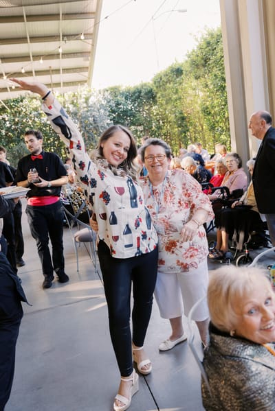 Residents and staff enjoying a lively celebration together