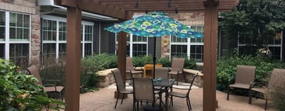 Outdoor seating area with umbrellas and tables