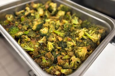 Pan of cooked broccoli ready for serving