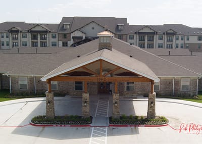 Exterior view of assisted living facility entrance.