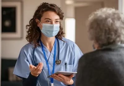 Staff member engaging with a resident in conversation