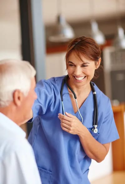 Healthcare worker interacting with a resident