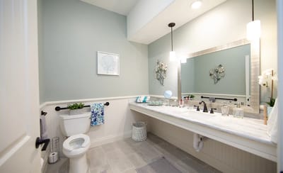 Modern bathroom with neutral decor and natural light