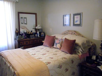 Comfortable resident room with a bed and decor