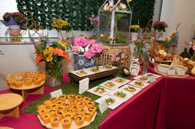 A beautifully arranged dining display with food and flowers