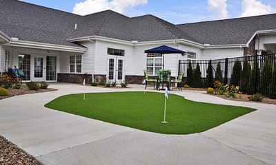 Outdoor putting green in a senior living facility