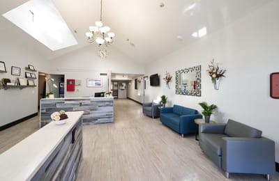 Bright interior common area with seating and decor