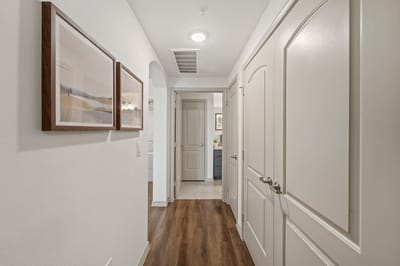 Bright interior hallway with decorative frames