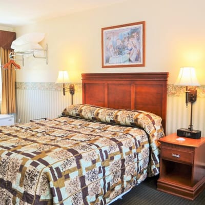 Private resident room with bed and artwork