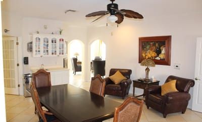 Interior common area with seating and dining table
