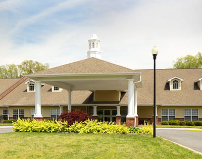 Exterior view of a senior living facility entrance