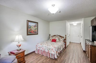 Cozy private resident room with floral bedding