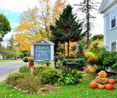 Outdoor view of Maple Terrace Community Care with fall decorations