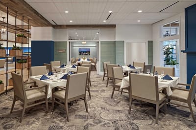 Dining room with tables set for a meal