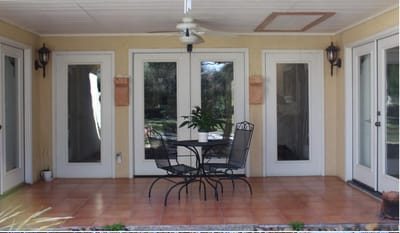 Patio area with a small table and chairs
