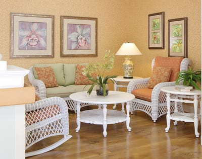 Bright and inviting common area with wicker furniture