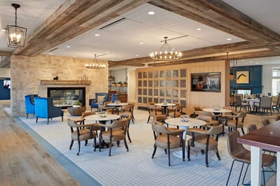 Bright dining area with tables and chairs