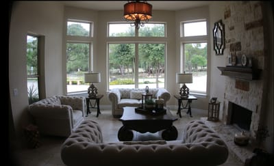 Bright common area with comfortable seating and windows
