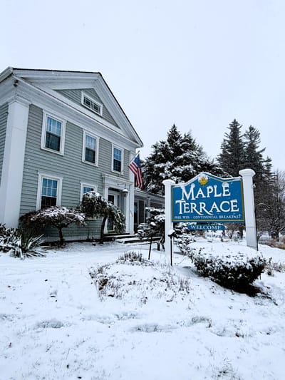 Snow-covered exterior of Maple Terrace Community Care