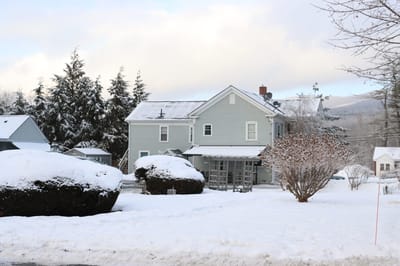Exterior view of a senior living facility in winter
