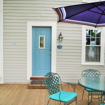 Exterior view of a house with outdoor furniture