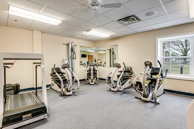 Interior view of a fitness area with exercise equipment
