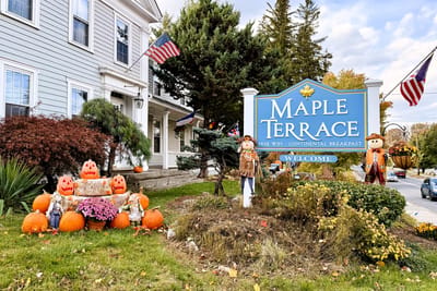 Exterior view of Maple Terrace with seasonal decorations