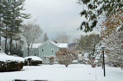 Snow-covered outdoor space at a senior care facility