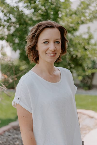 Portrait of a staff member outside in the garden