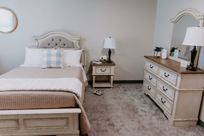 Cozy private bedroom in a senior living facility