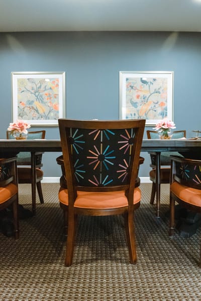 Colorful chairs arranged in a common area