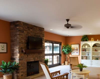 Cozy common area with seating and fireplace