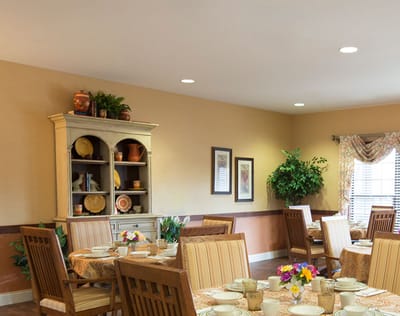 Dining area with tables set for a meal