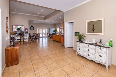 Bright common area with seating and activity space