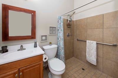 Clean bathroom with modern fixtures and accessibility features